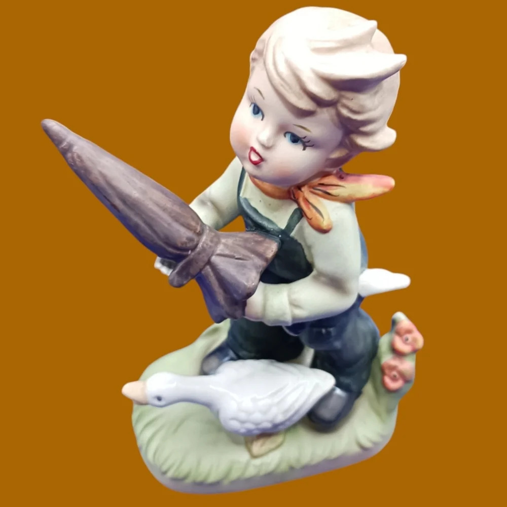 Napco boy with goose and umbrella "6"figurine